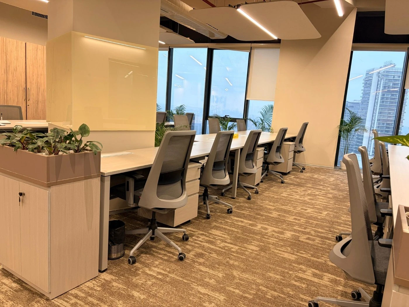 Workstations with task chairs on an installed floor